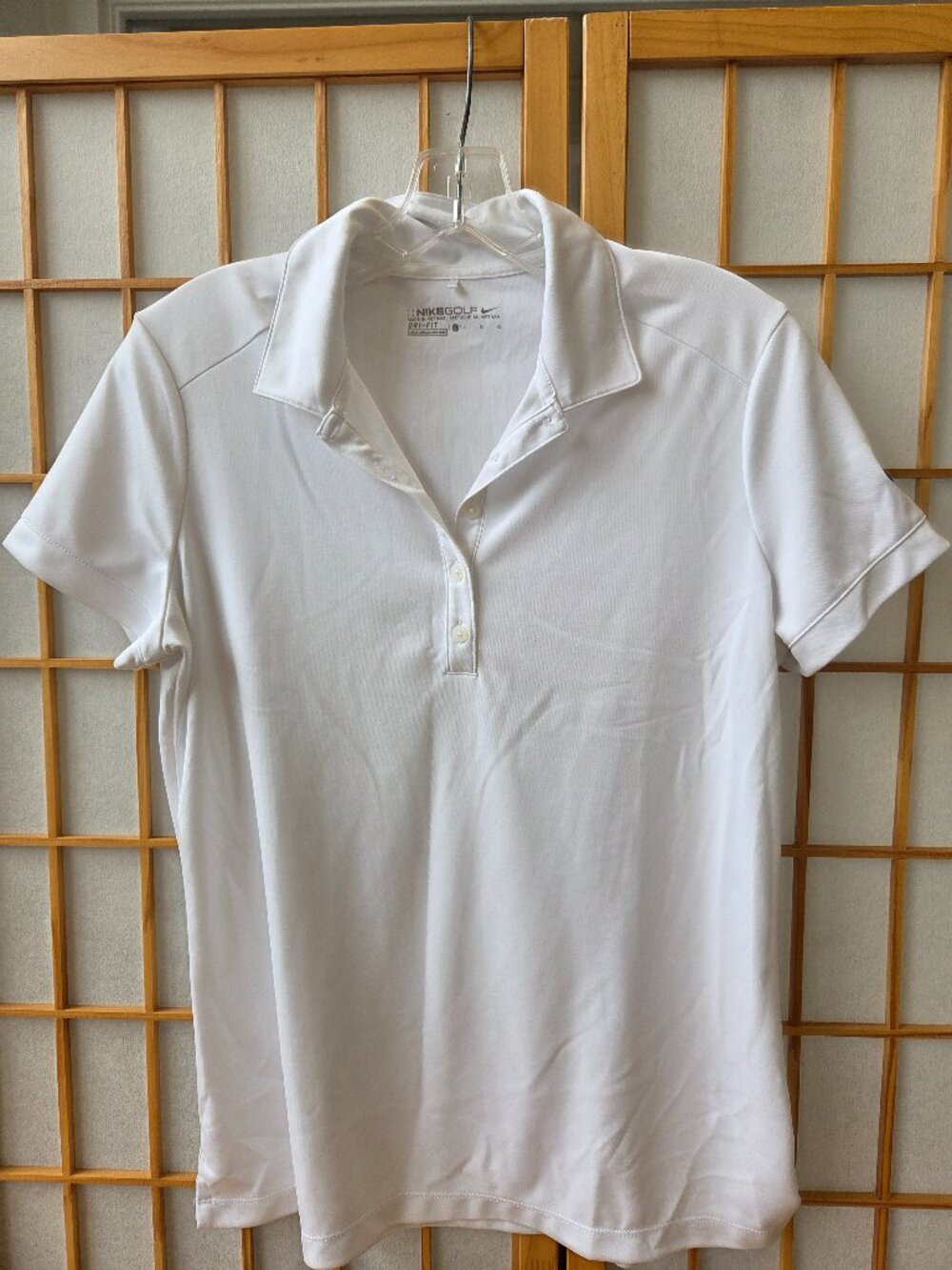 White Nike Women's golf shirt